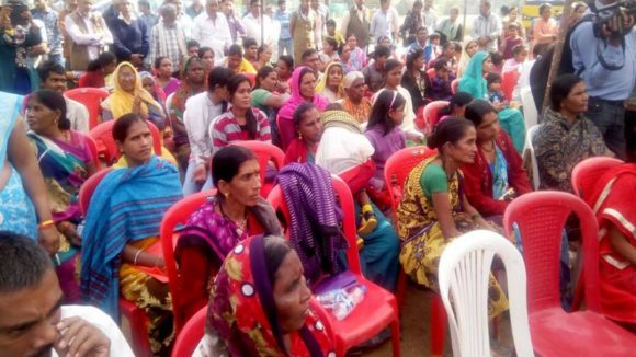 People in Bhopal, India attend a busy eye screening meeting.