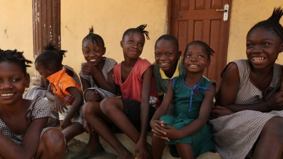 A group of children smiling