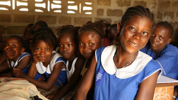 A visually impaired girl attends school.
