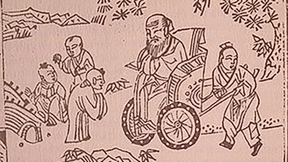 An ancient Chinese artwork featuring a man being wheeled in a chair.