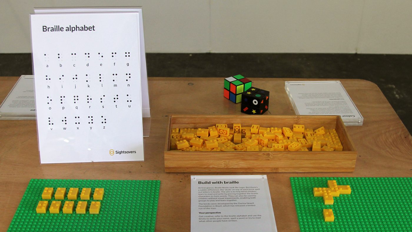 A close-up of a box of Braille Bricks on Sightsavers' stand.