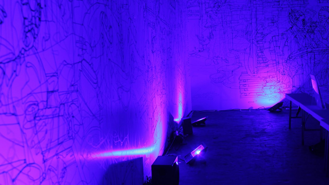 Inside the colour room on Sightsavers' stand: the room is bathed in blue light, revealing an illustration on the wall.