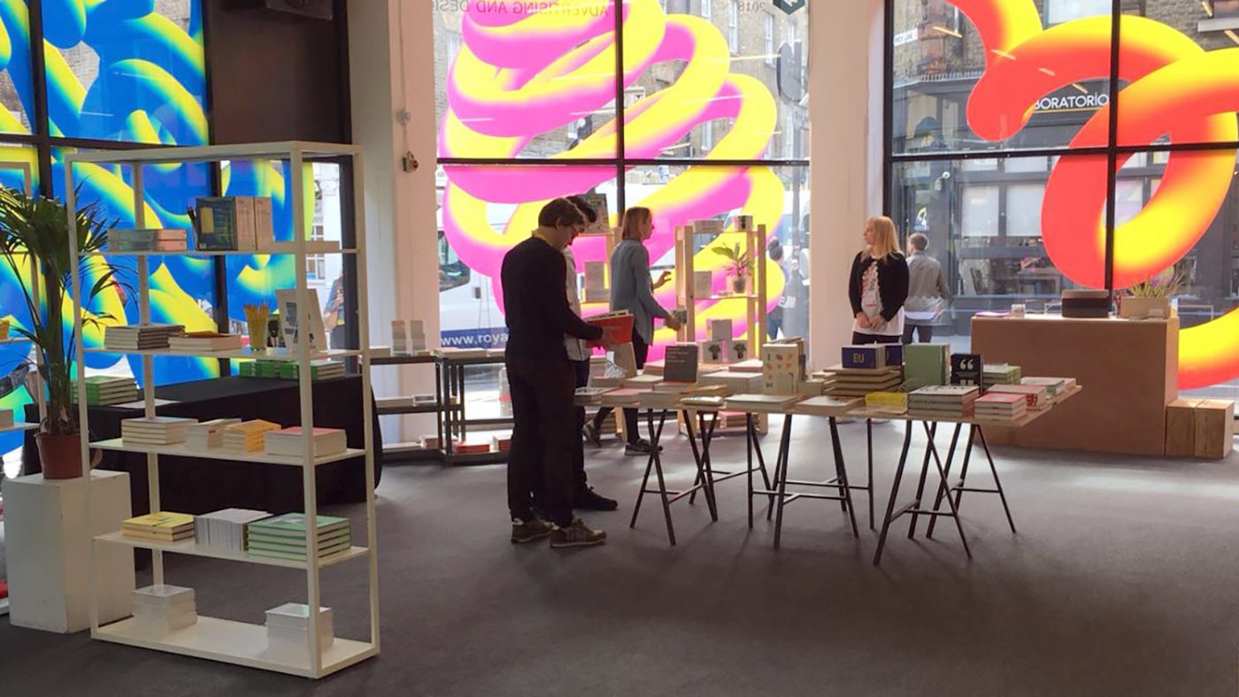 Visitors to the festival in the shop.