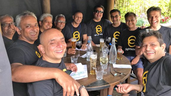 The runners relax in the pub after their run.