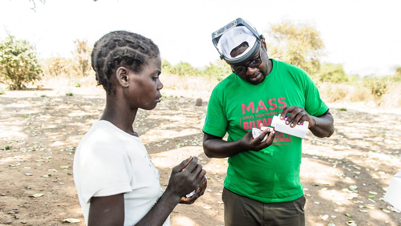 Givemore counting tablets to give to a lady with trahcoma.