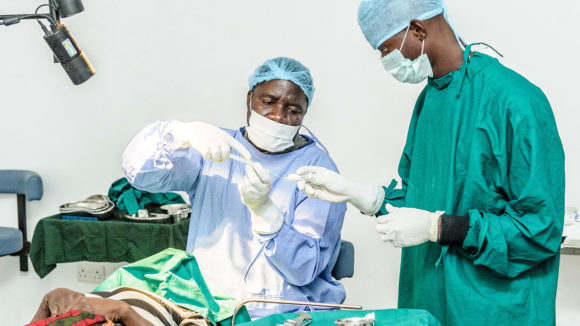 Mr Ndalela performs a trichiasis operation on Mariah.