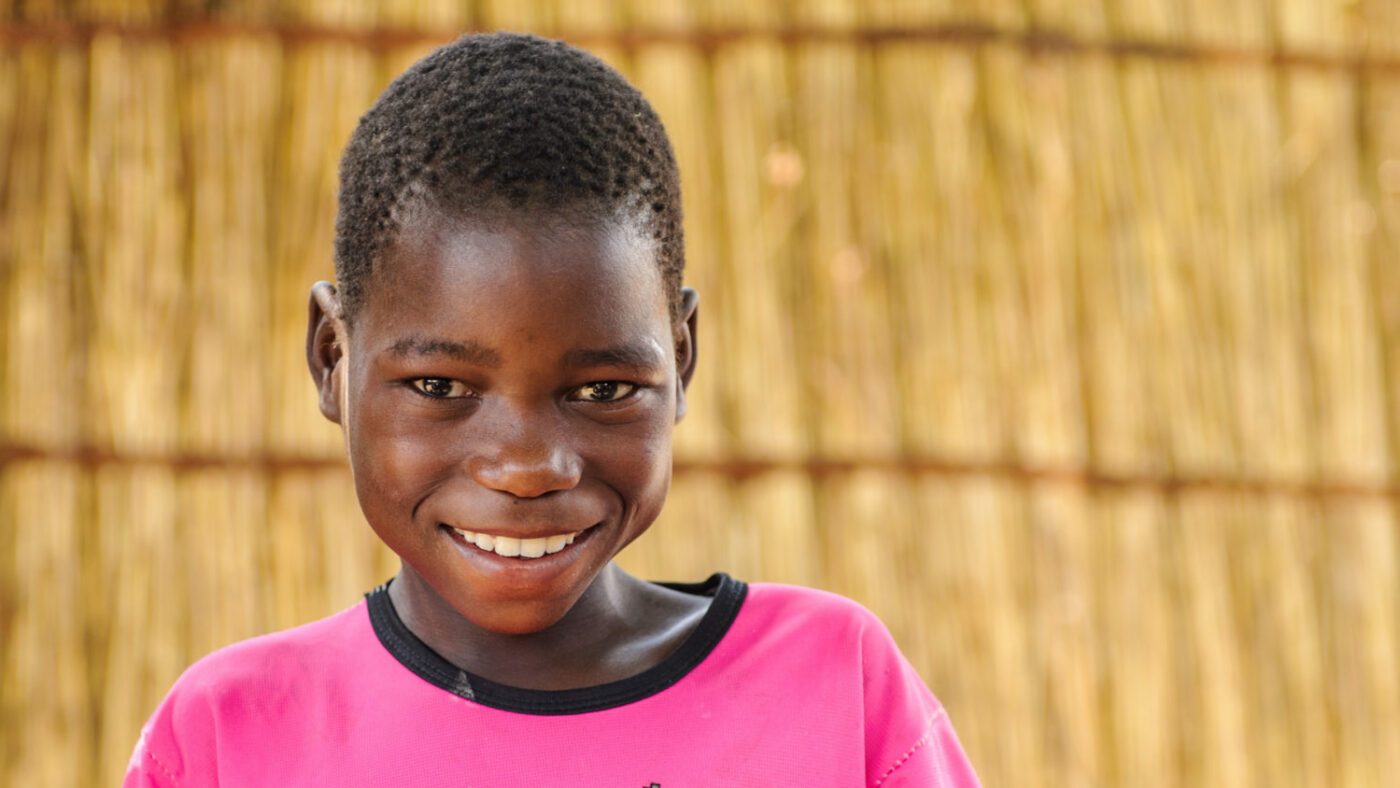 Mwiza showing significant improvement and ready to start school after receiving treatment a year and half ago.