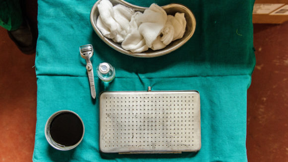 Surgical equipment laid out on a table.