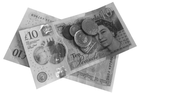 A pile of English money, including coins and notes.