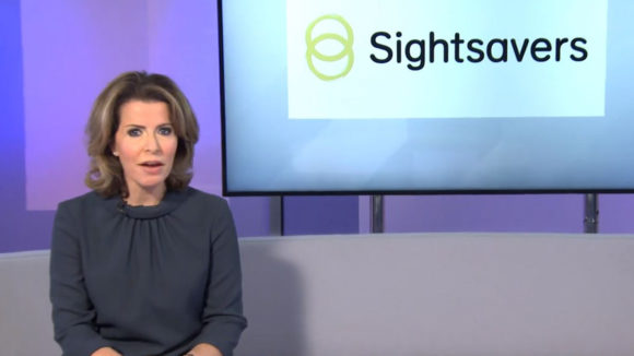 A still from Sightsavers' film with ITN, showing presenter Natasha Kaplinsky alongside the Sightsavers logo.