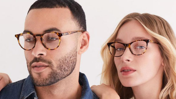 Two models wearing DIFF glasses, from the DIFF advertising campaign.