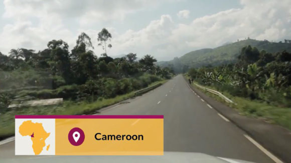An example of the location lower third used in the video, with the text 'Cameroon'.