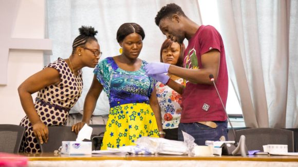 Participants at a blood collection training session.