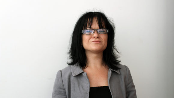 A portrait of Erin Pritchard.