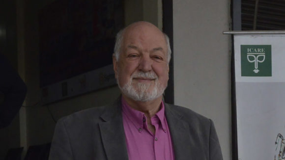 A portrait of Sir Clive Jones.