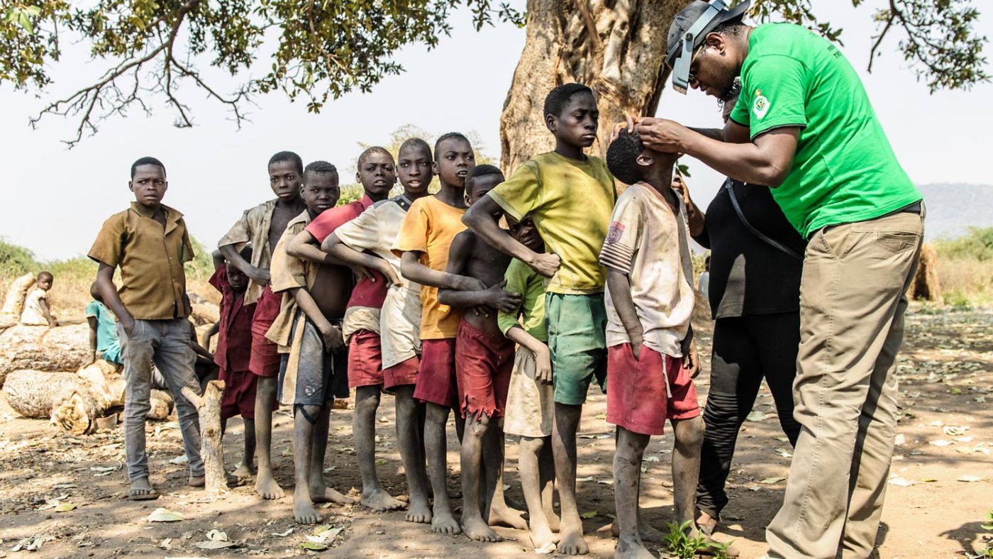 A group trachoma screening for children in Zimbabwe.