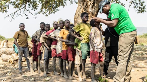 A group trachoma screening for children in Zimbabwe.