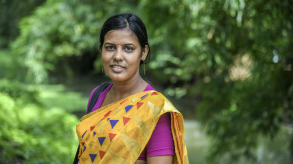 A women smiling.