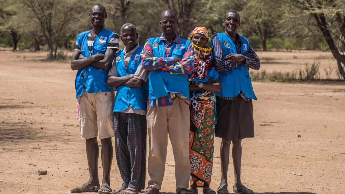 Community health volunteers stand outside in Nachuru, Turkana, Kenya.