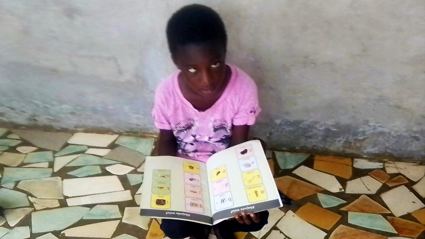 A child with a book.