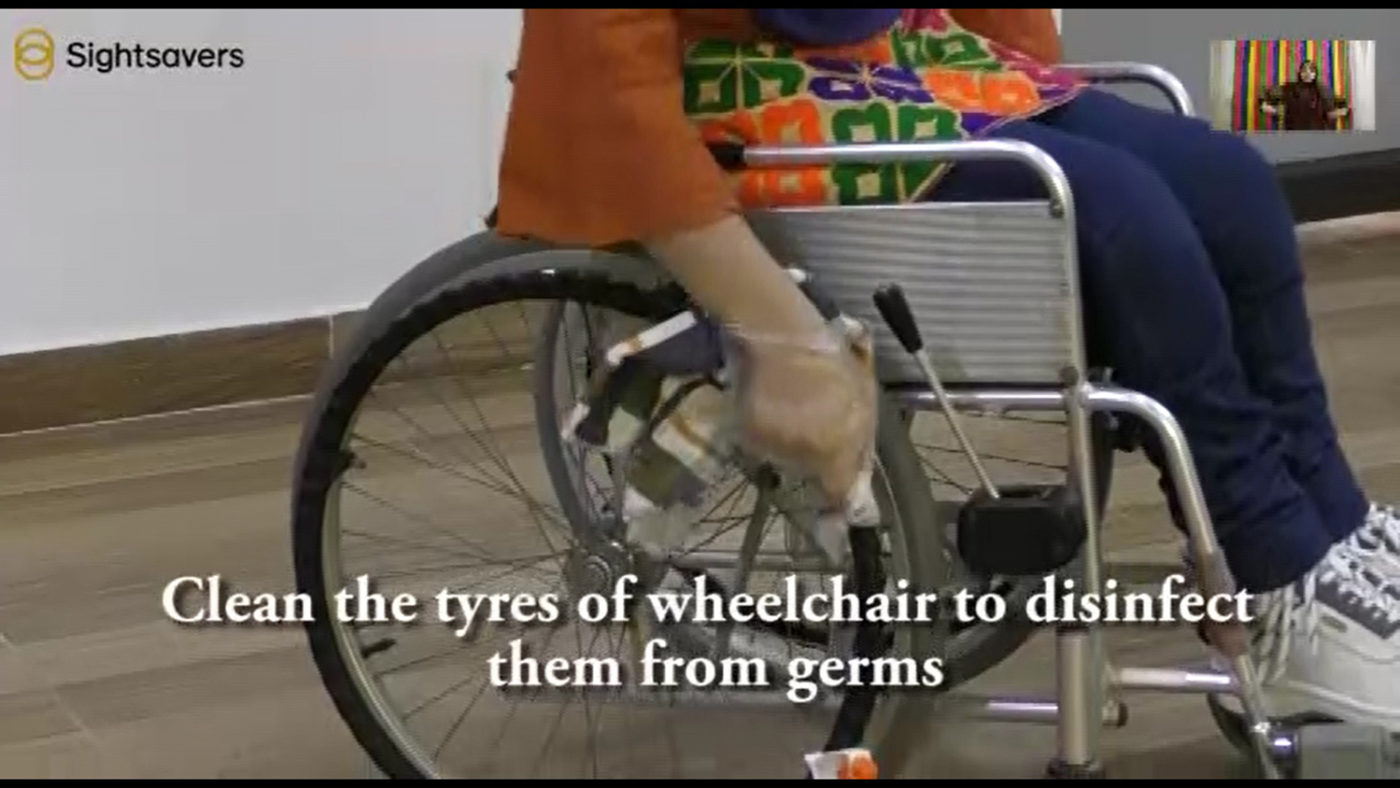 A still from a video explaining how to clean a wheelchair.