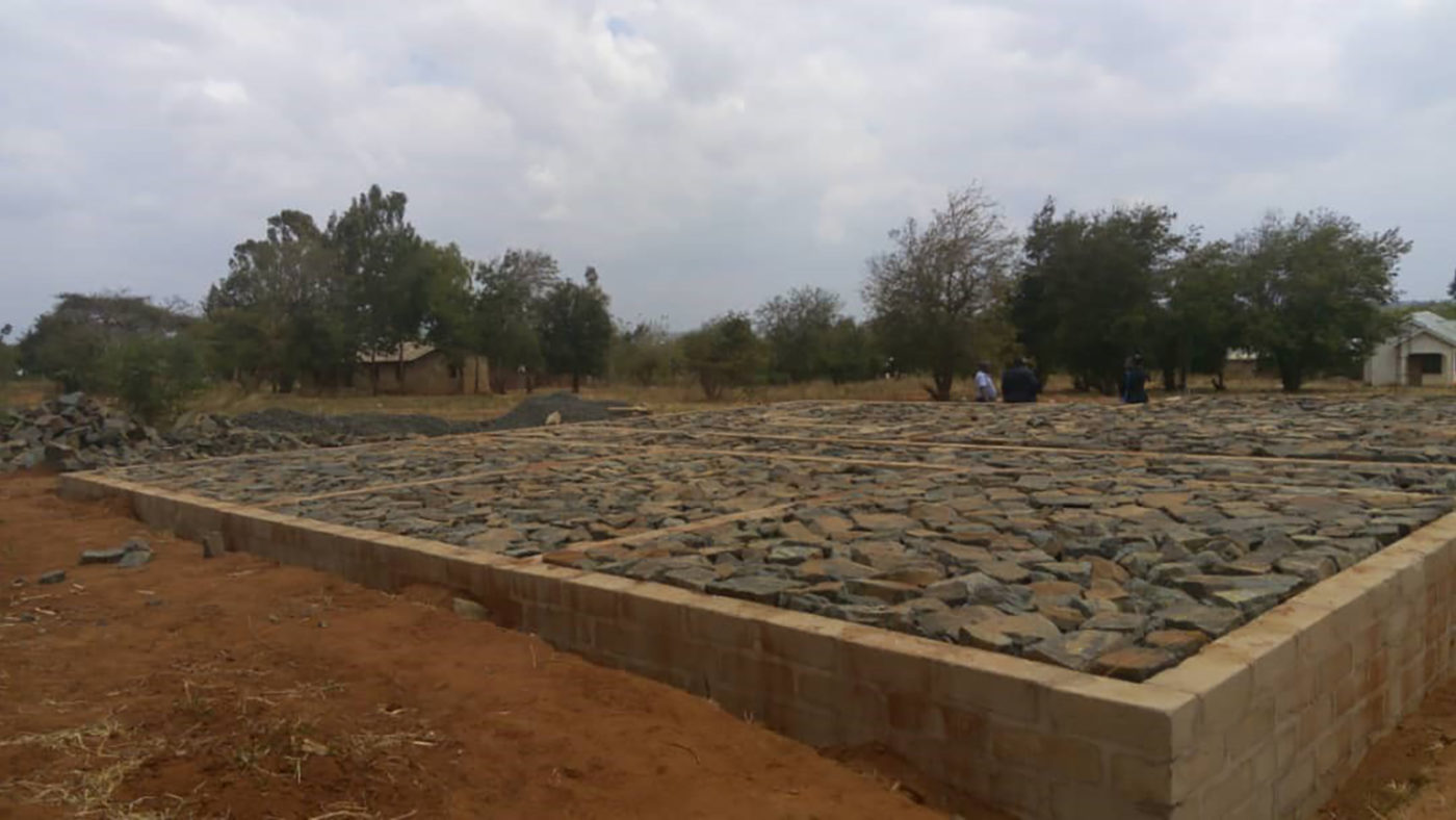 The foundations of a building begin to be laid.
