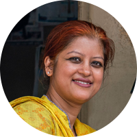 A woman smiling.