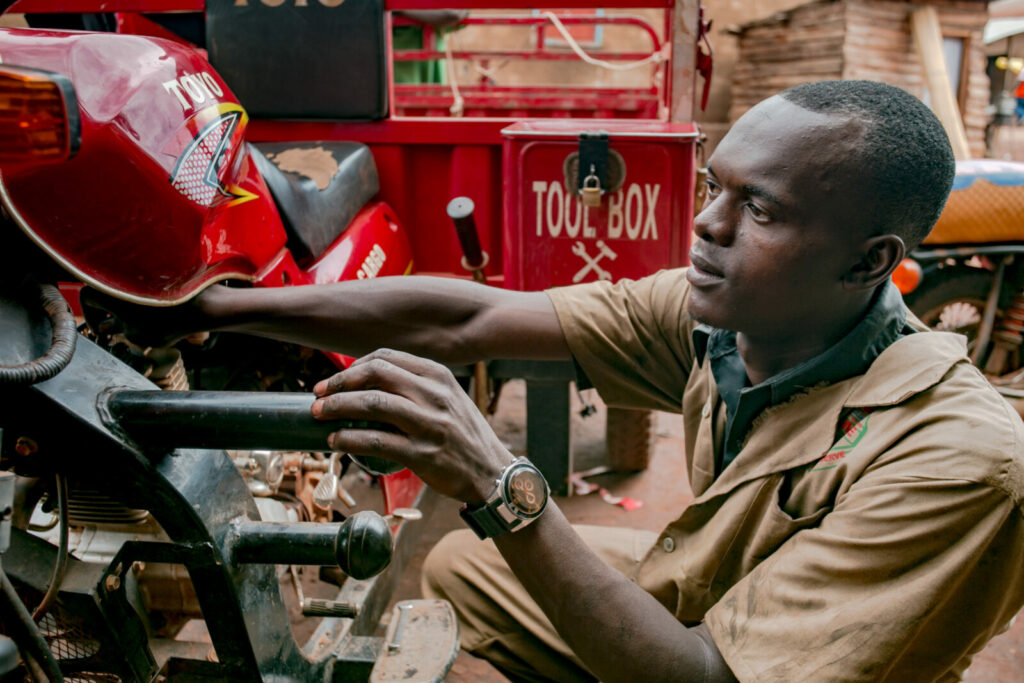 Sharif working at the garage.