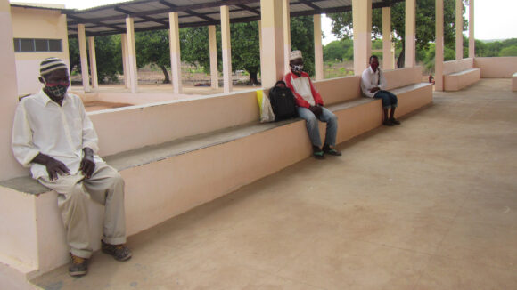 Patients at the community health centre wait to be examined.