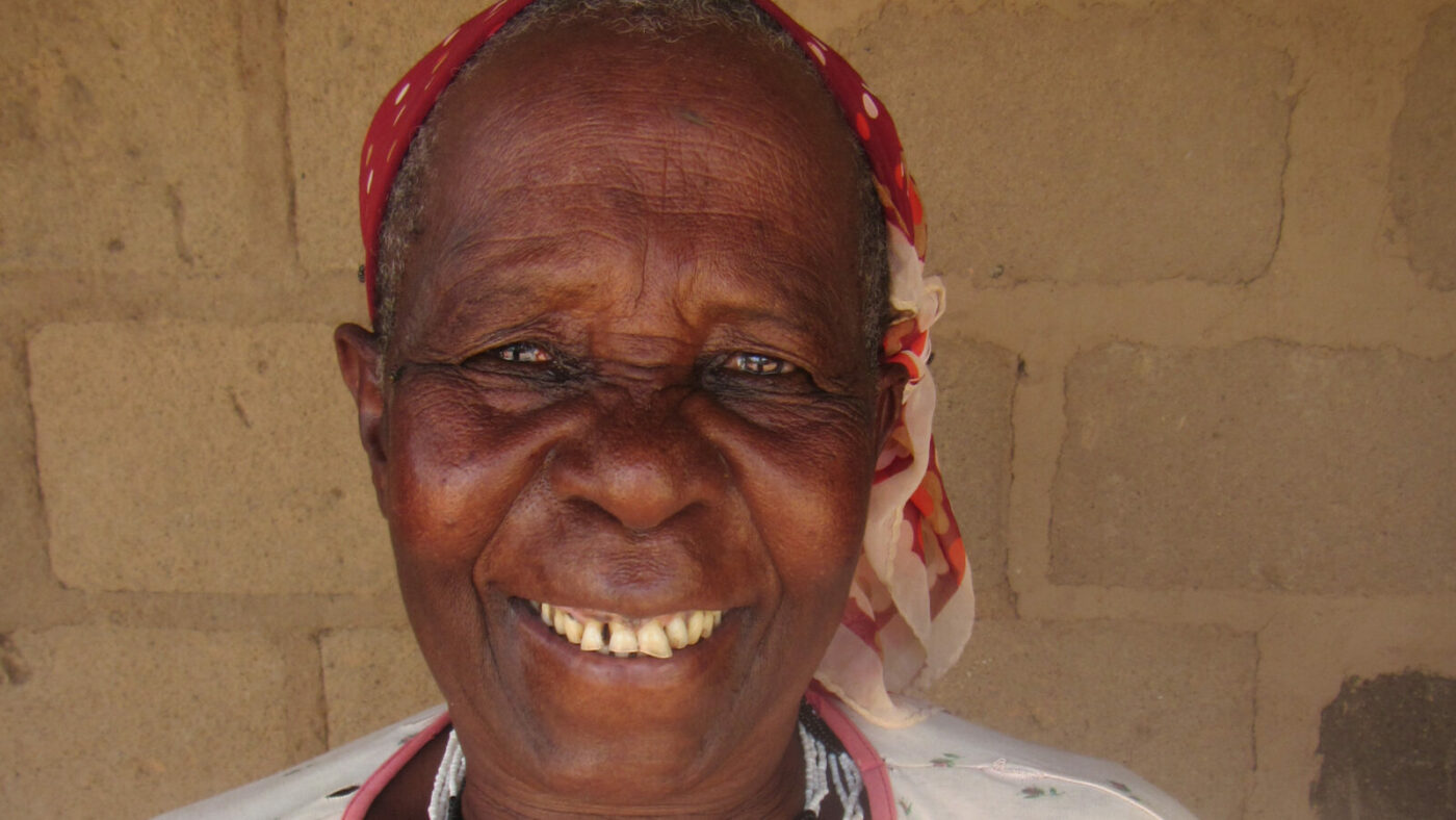 a woman smiles.