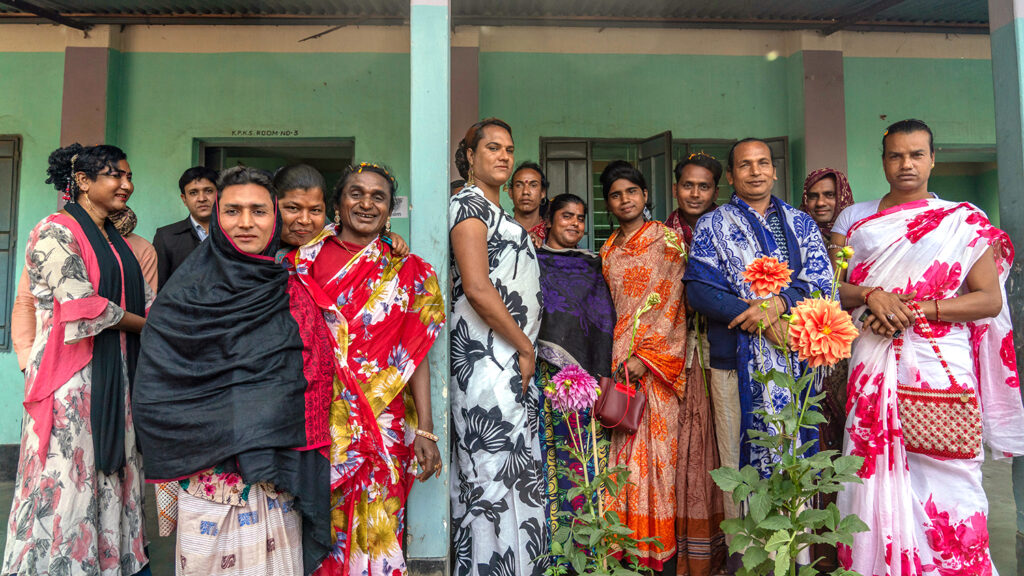 A group of women standing outside.