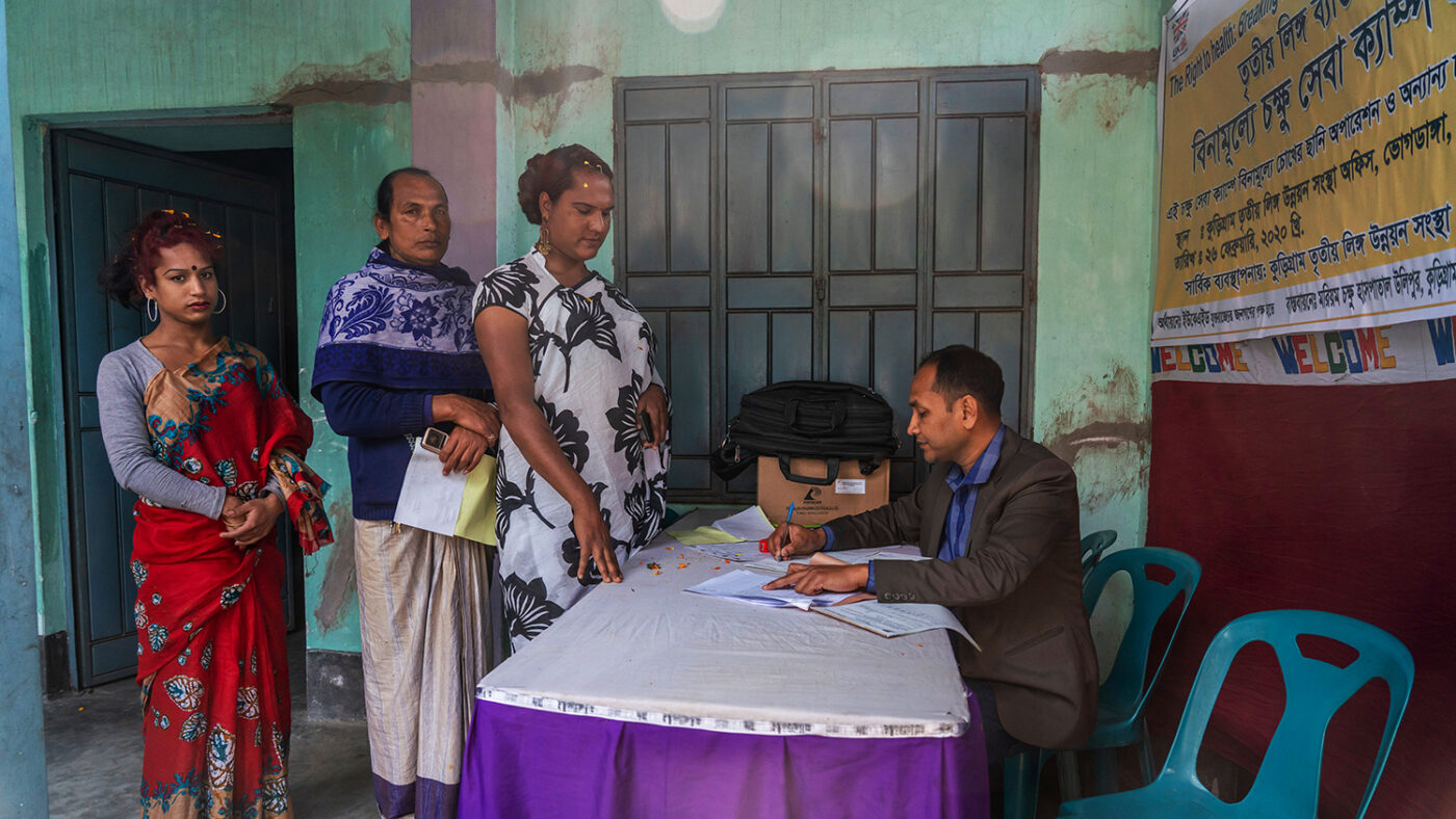 Women at registration desk of a eye health screening camp.