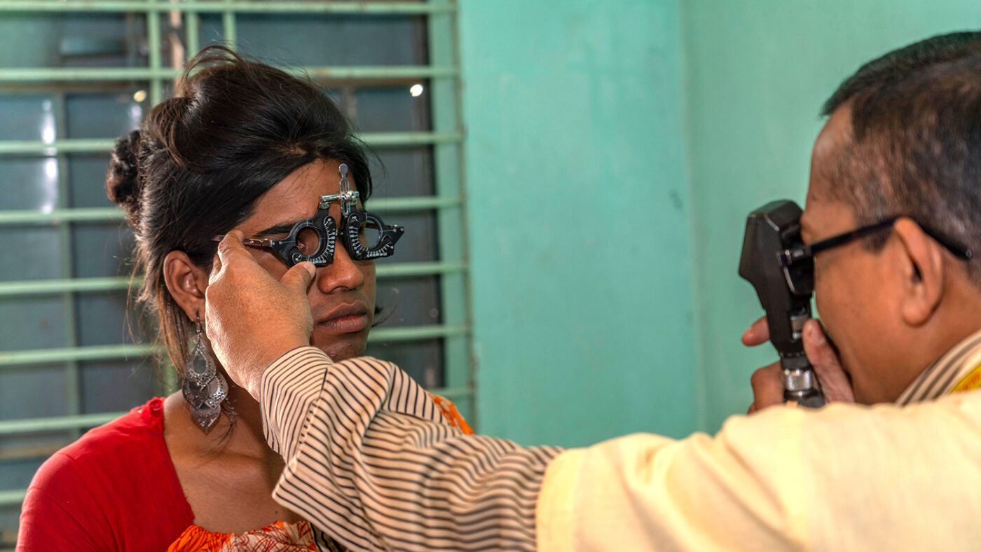 Women having sight tested.