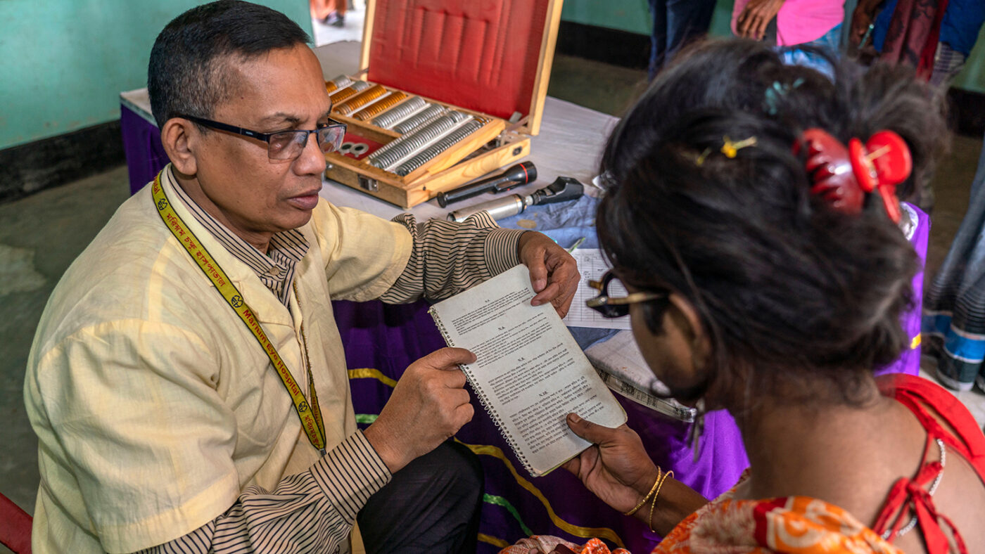 Women having sight tested.