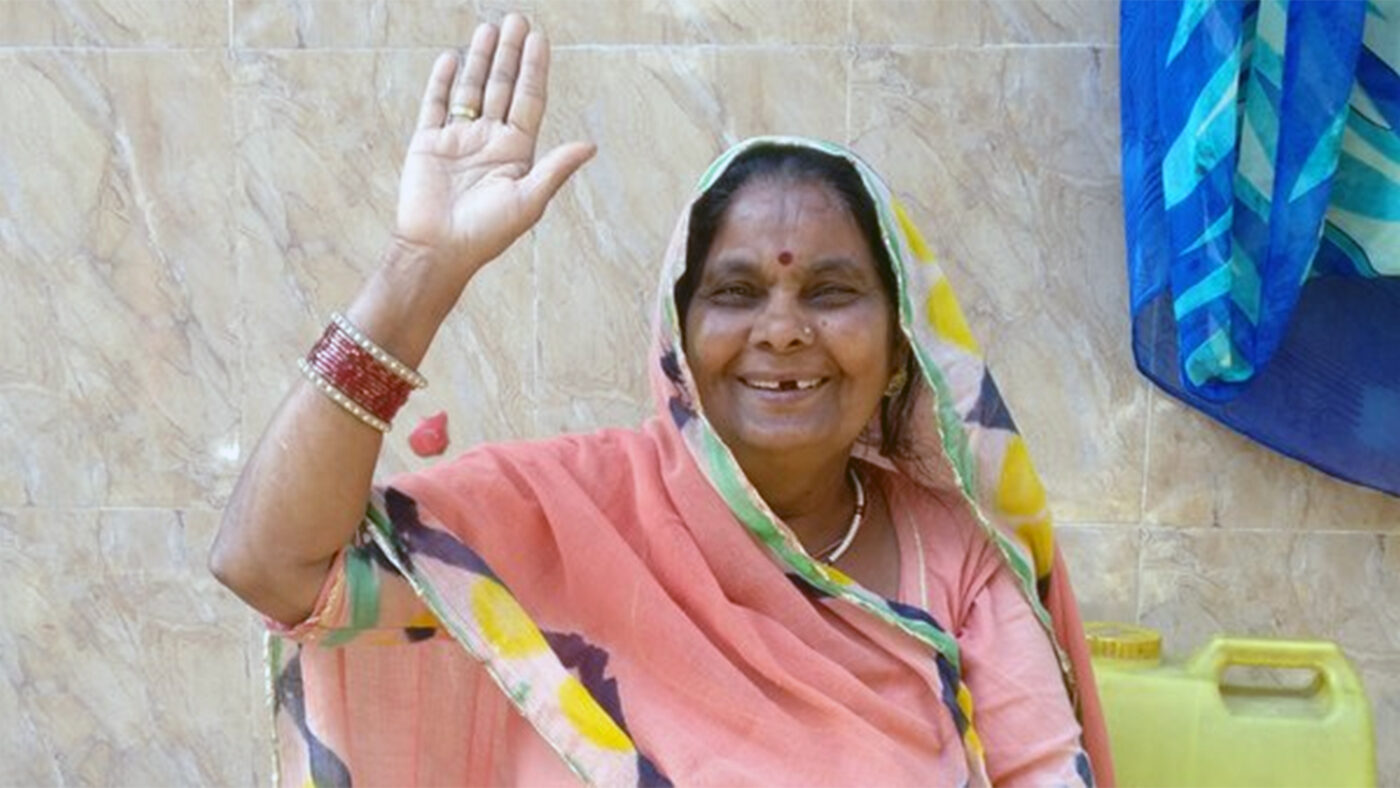 Bhanwar waves at the camera after her cataract surgery.