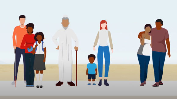 A still from Sightsavers health systems video, showing a group of people standing in a line: a family, an older man with a cane, a mother and child, and a couple.