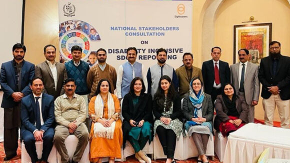 Attendees from the SDG consultation in Pakistan pose for a group photo.