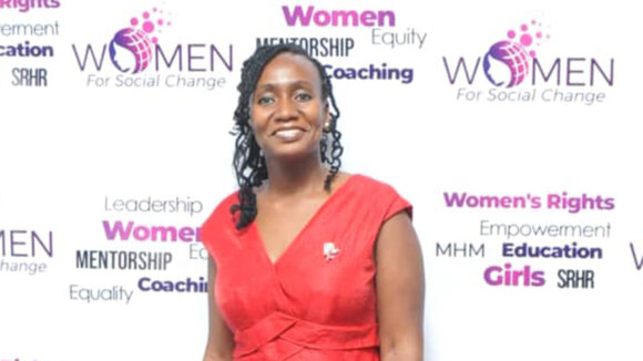 Moira attending an event for International Women's Day.