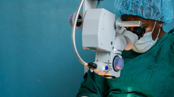Eye surgeon Upendo performs a cataract operation.