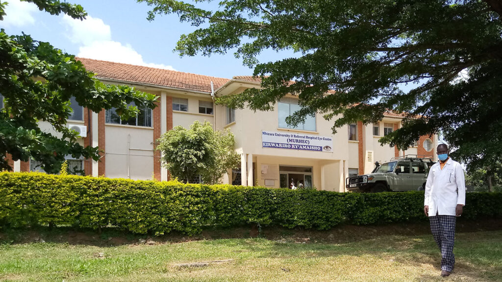Trainee ophthalmologist Moses Iriama stands outside a university eye care centre in Moroto, Uganda.