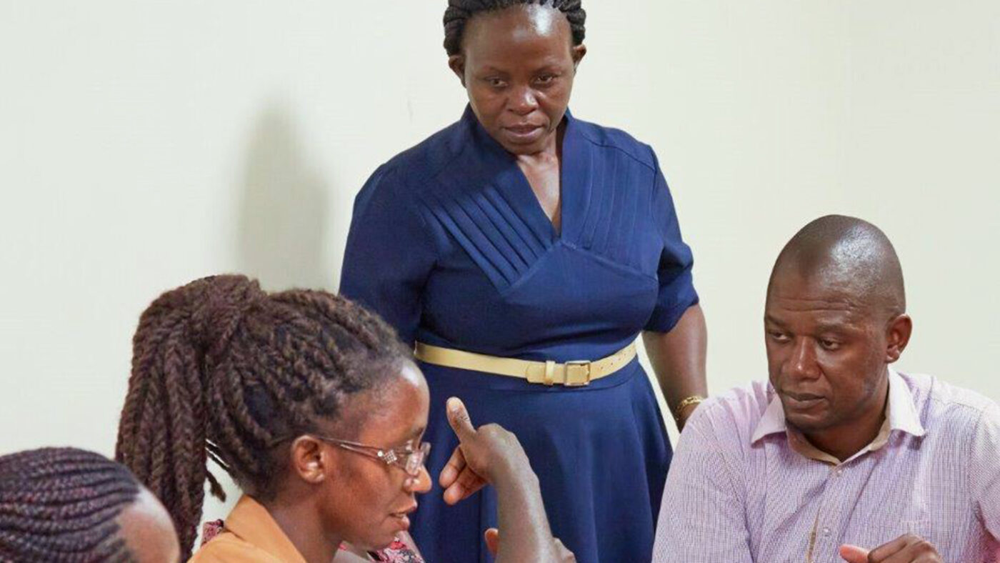 Women discuss gender-based violence at a workshop in Uganda.