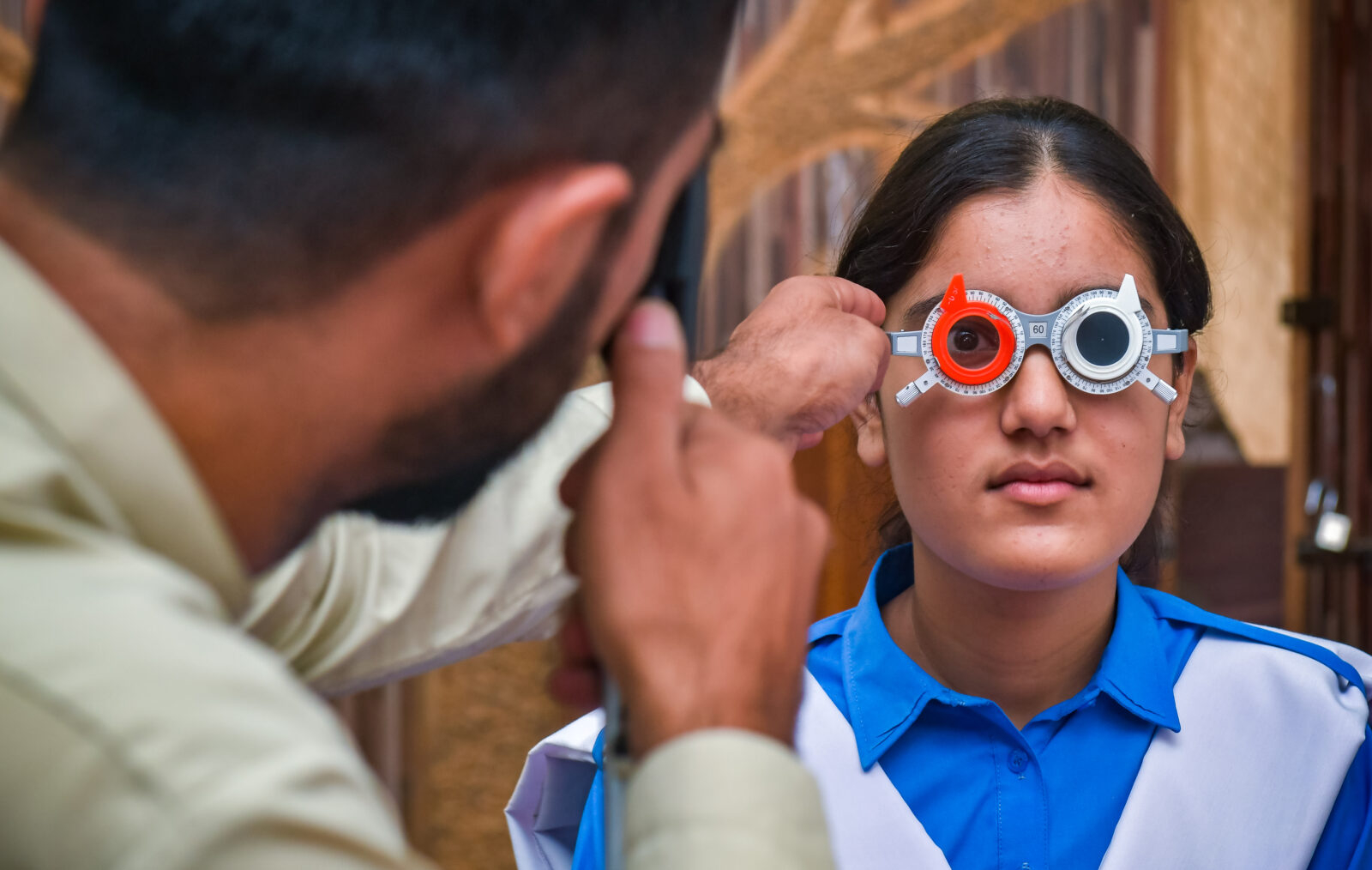 Zahra has her eyes examined.