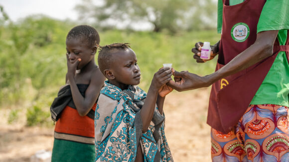 A child in Kenya receives medication to protect them from trachoma.