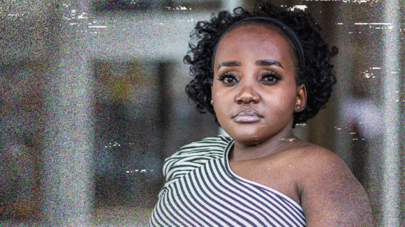 A portrait picture of Michelle who has a serious expression on her face.