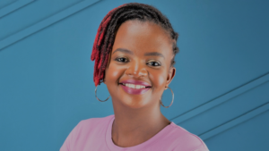 A portrait image of Sarah smiling.