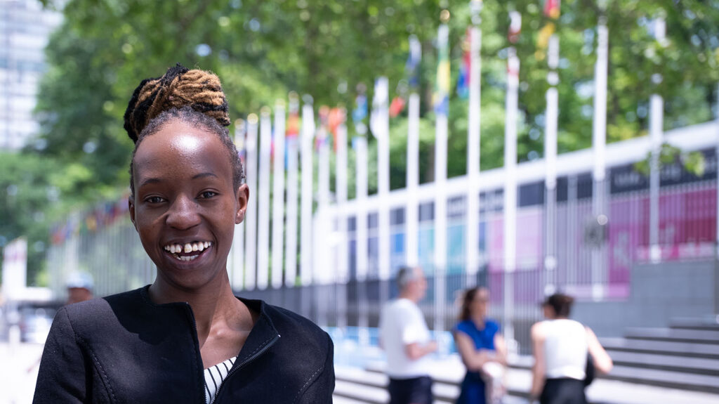 Maryanne stands outside the UN building in New York during COSP-18.